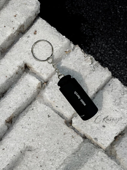 Porte clé lampe de poche noir
