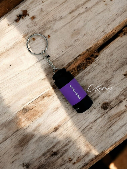 Porte clé lampe de poche violet