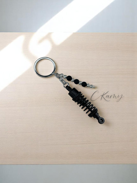Porte clé personnalisé amortisseur noir