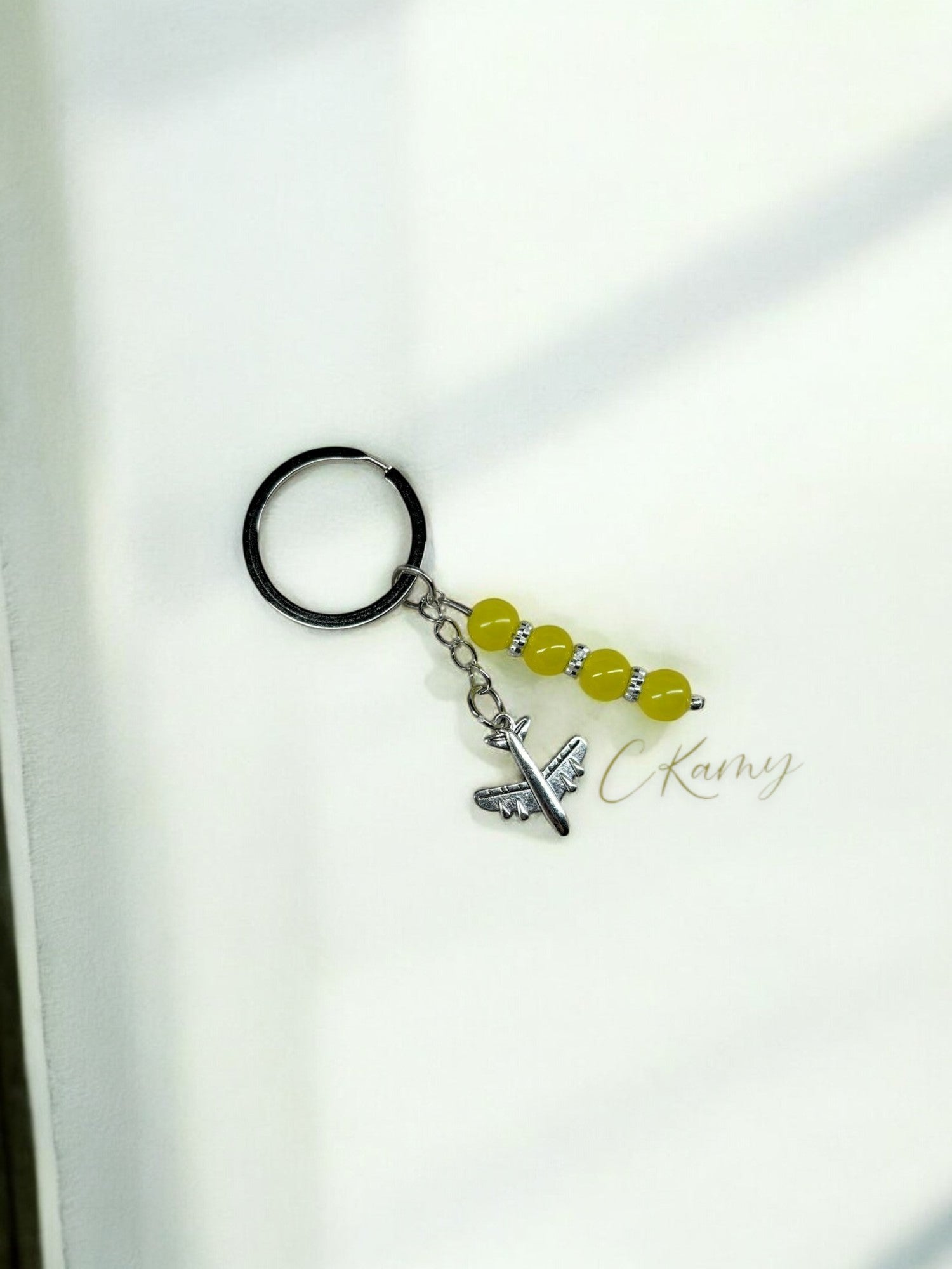 Porte clé personnalisé avion jaune anneau rond