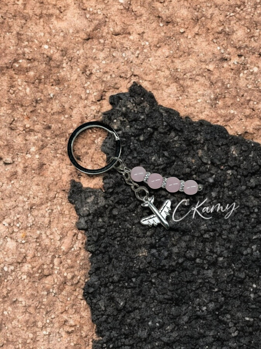 Porte clé personnalisé avion rose anneau rond