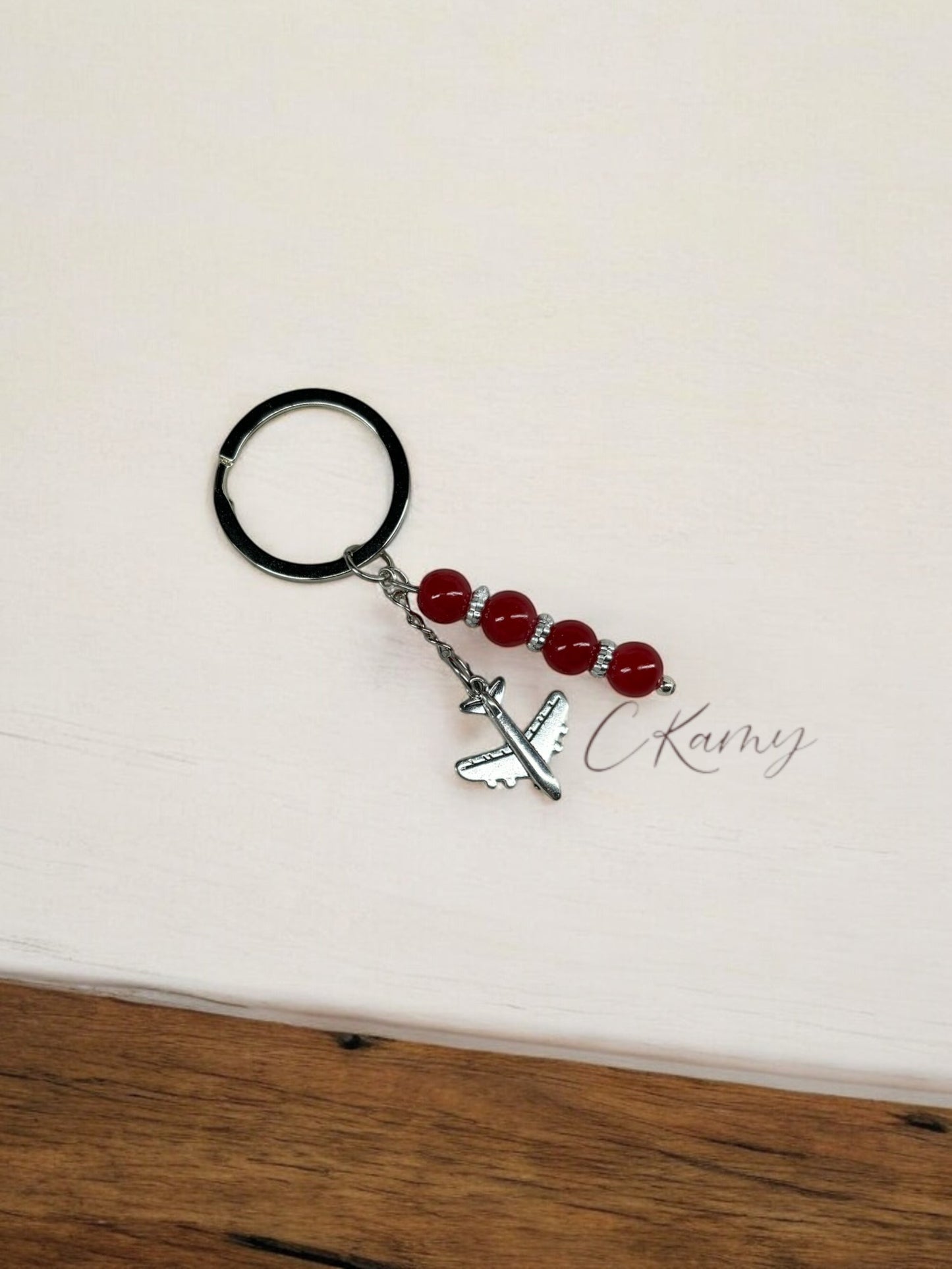 Porte clé personnalisé avion rouge anneau rond