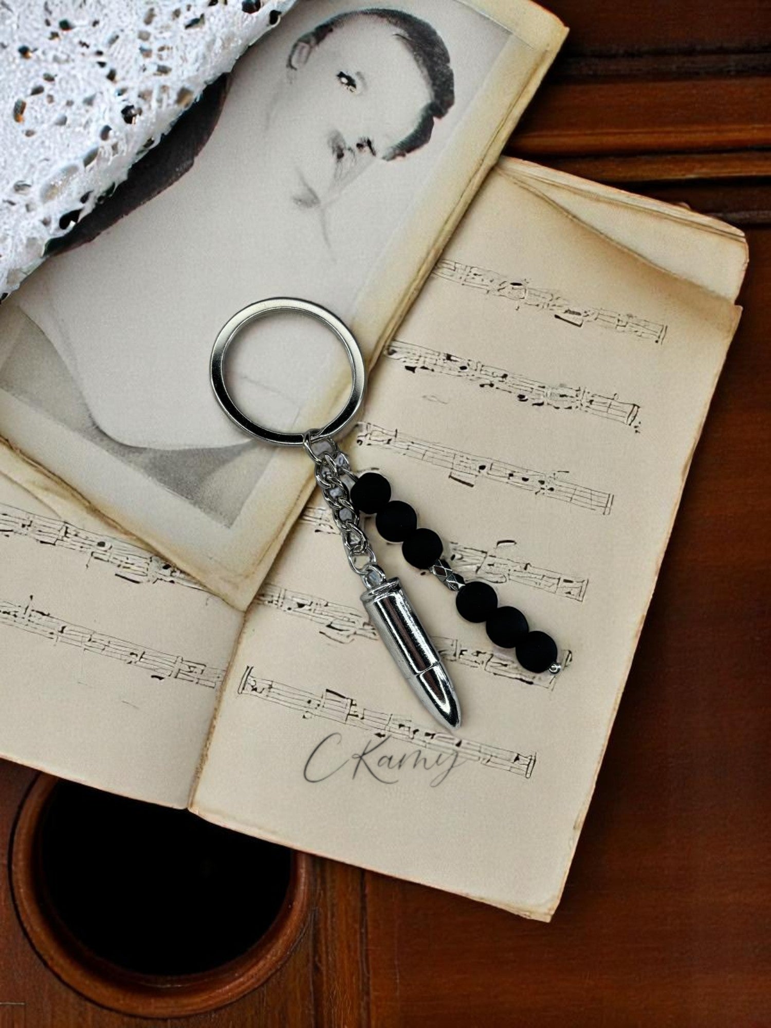 Porte clé personnalisé balle argent