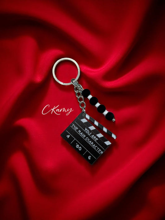 Porte clé personnalisé clap de cinéma noir