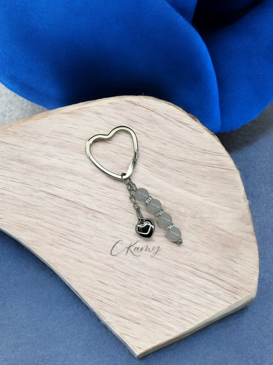 Porte clé personnalisé coeur bombé blanc grisé