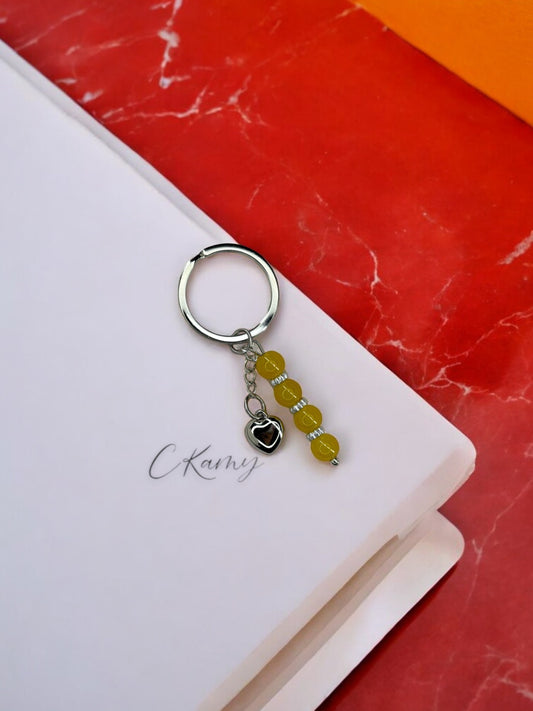 Porte clé personnalisé coeur bombé jaune orangé