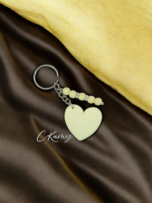 Porte clé personnalisé coeur silicone crème