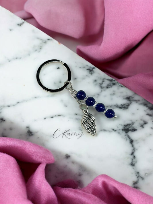 Porte clé personnalisé coquillage bulot bleu foncé