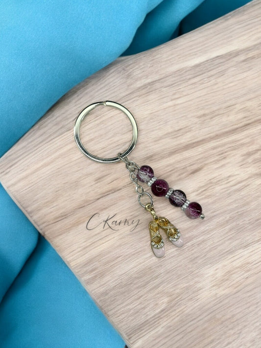 Porte clé personnalisé demi pointe prune
