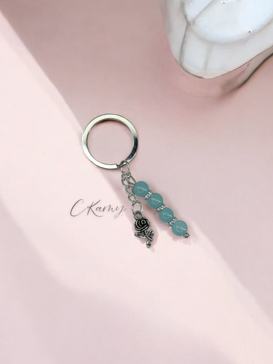 Porte clé personnalisé fleur rose bleu clair