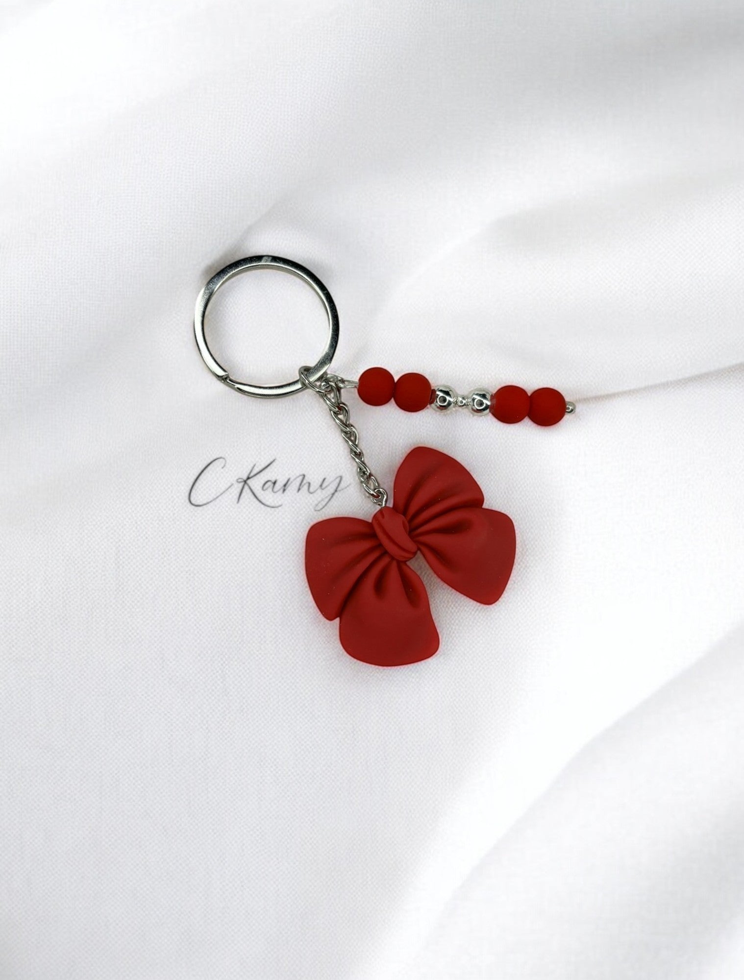 Porte clé personnalisé grand noeud rouge