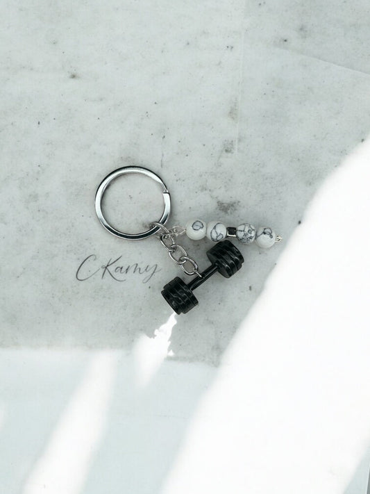 Porte clé personnalisé haltère noir blanc