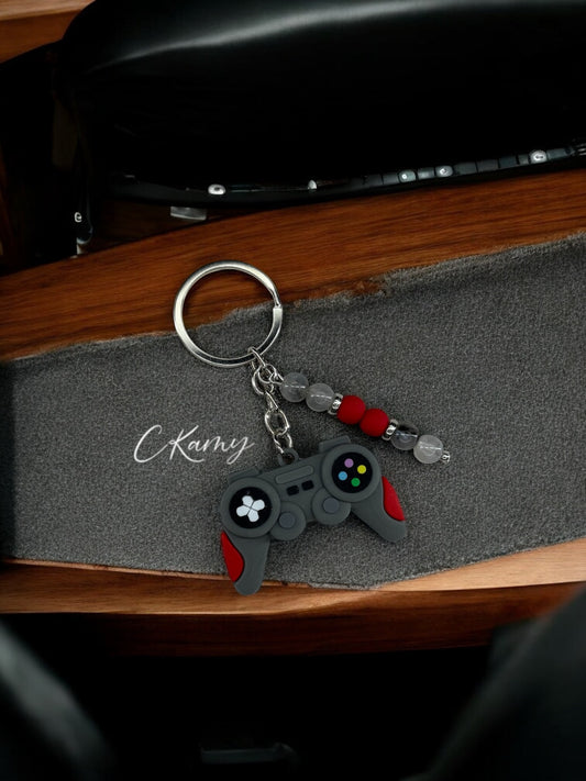 Porte clé personnalisé manette play gris rouge