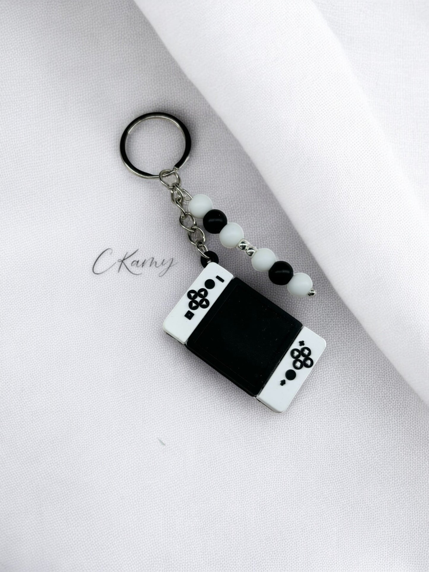 Porte clé personnalisé manette switch noir blanc