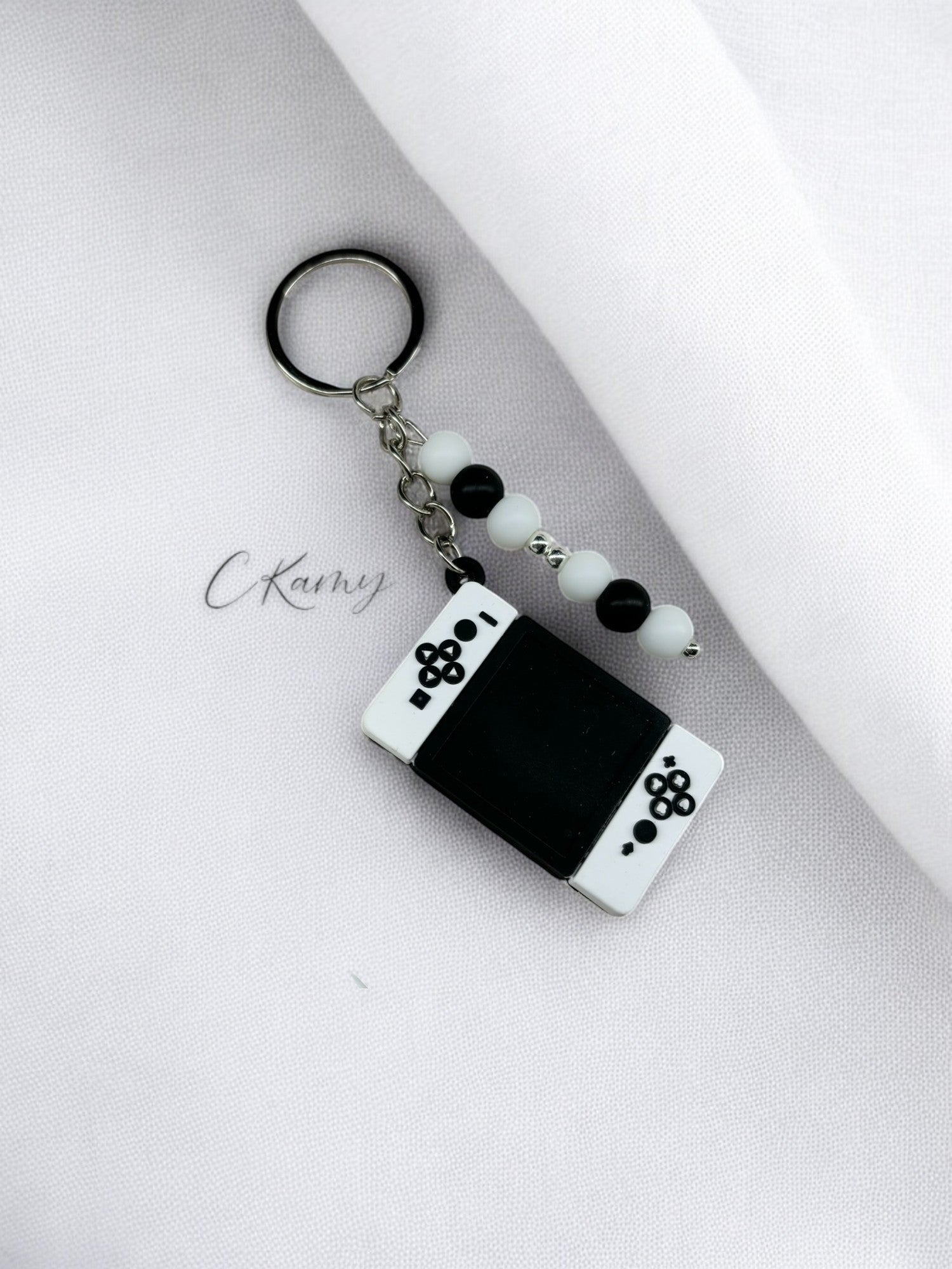 Porte clé personnalisé manette switch noir blanc