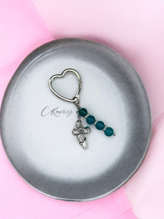 Porte clé personnalisé noeud bleu turquoise