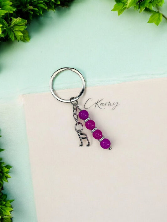 Porte clé personnalisé note de musique rose flash