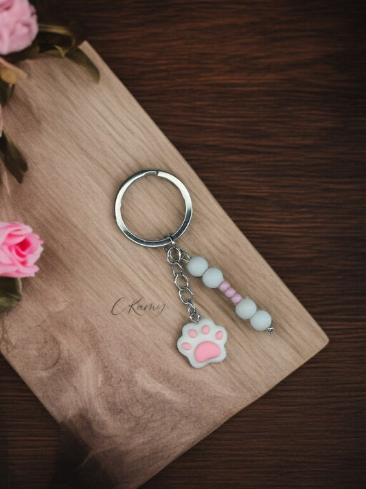 Porte clé personnalisé patte de chat rose blanc