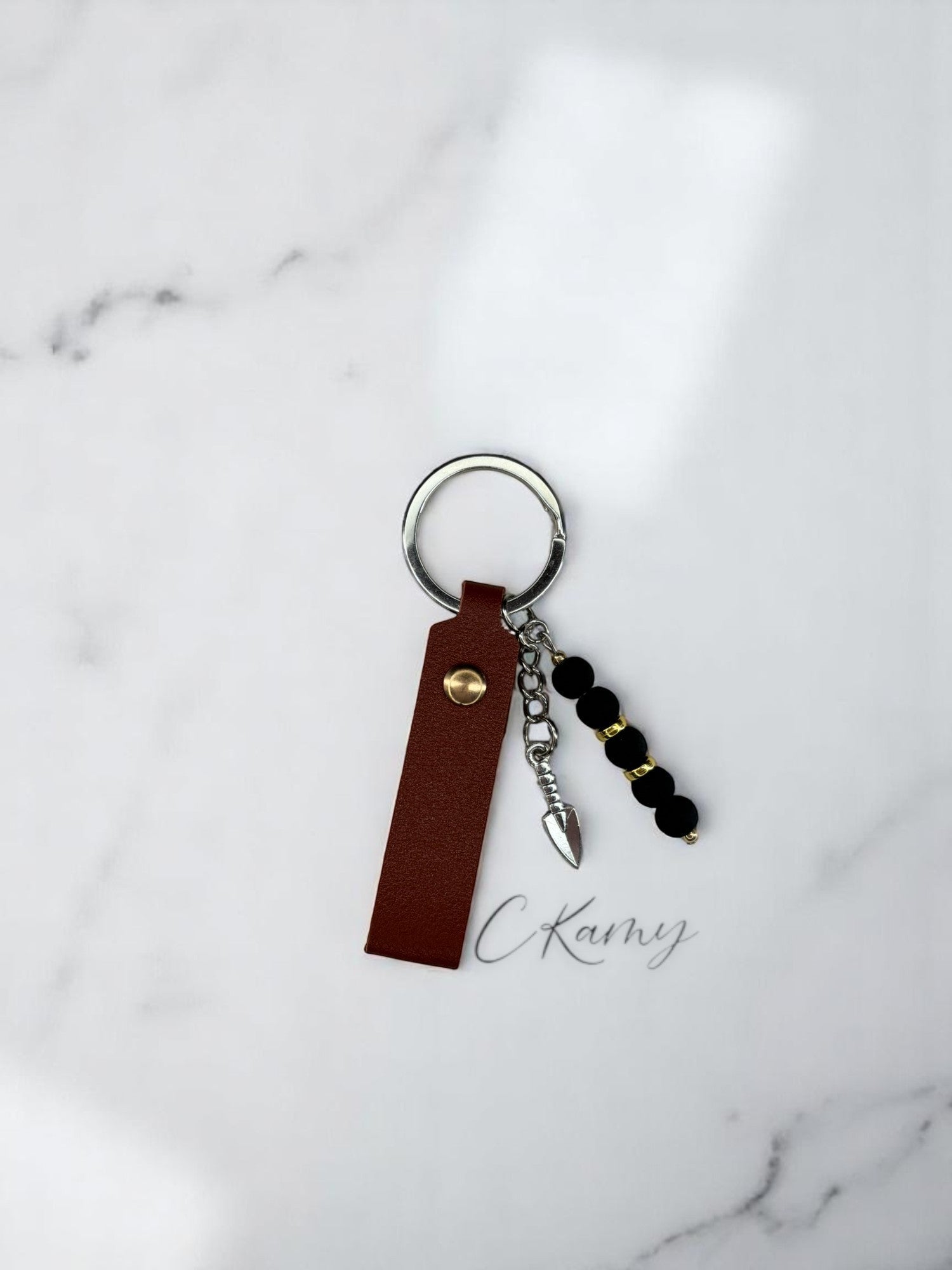 Porte clé personnalisé pelle noir