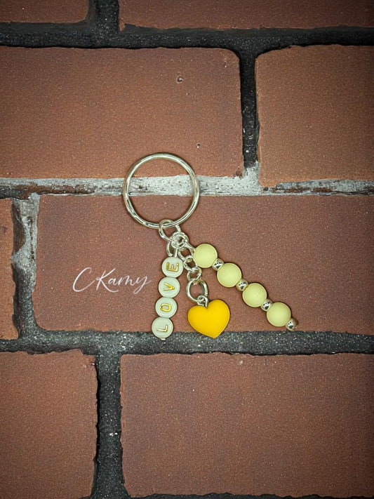 Porte clé personnalisé petit coeur jaune rond