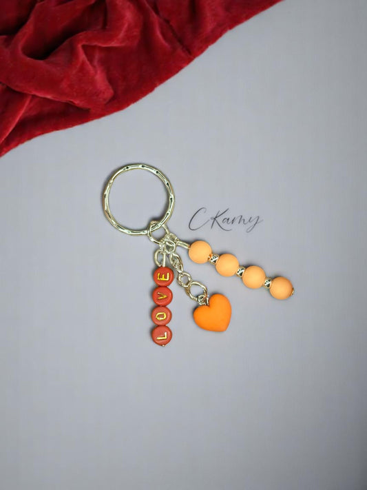 Porte clé personnalisé petit coeur orange rond