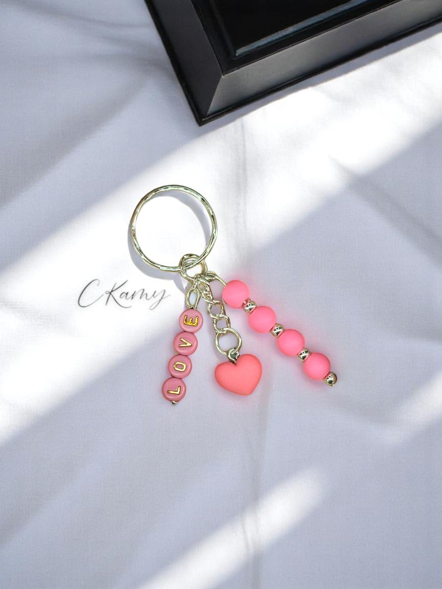 Porte clé personnalisé petit coeur rose flash rond