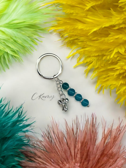 Porte clé personnalisé petit noeud bleu turquoise