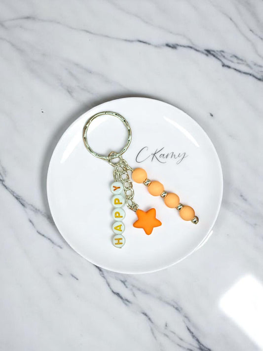 Porte clé personnalisé petite étoile orange rond