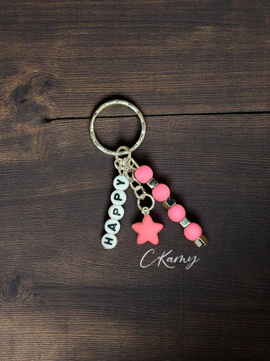 Porte clé personnalisé petite étoile rose flash carré