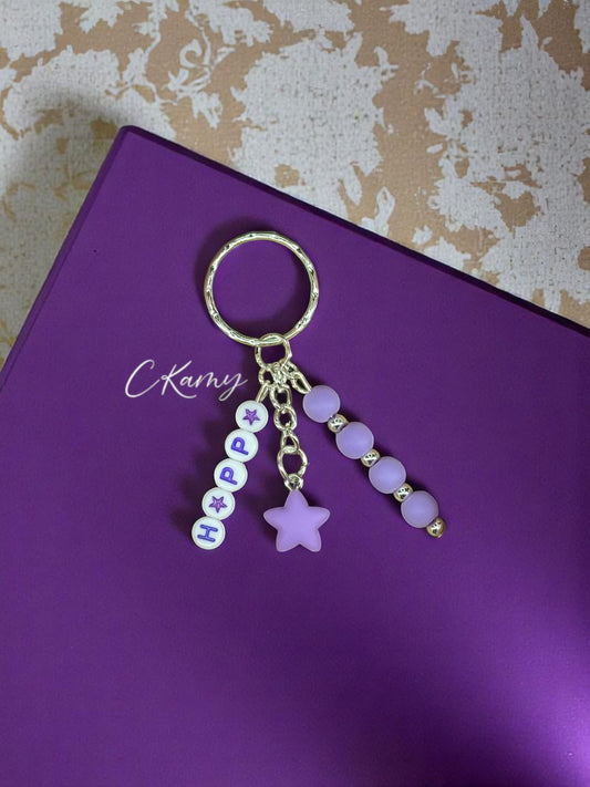 Porte clé personnalisé petite étoile violet rond