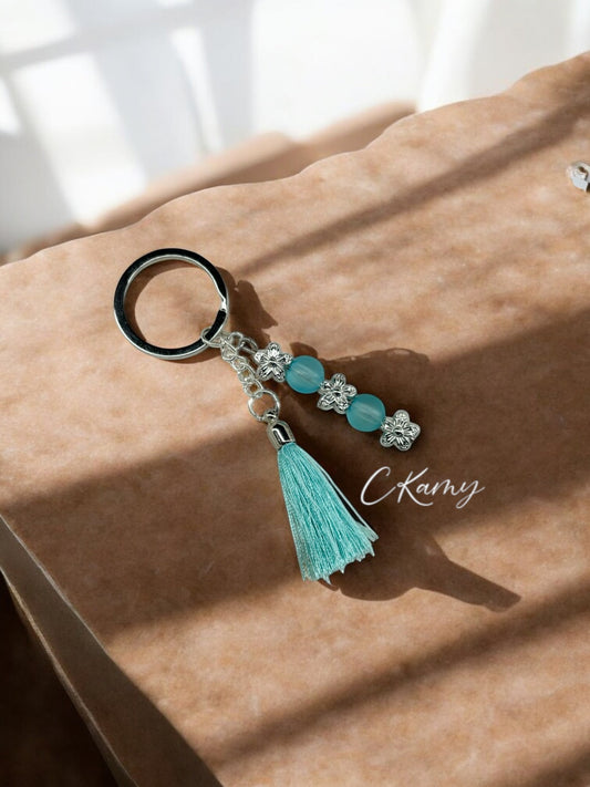 Porte clé personnalisé pompon fin bleu clair bleu clair mat
