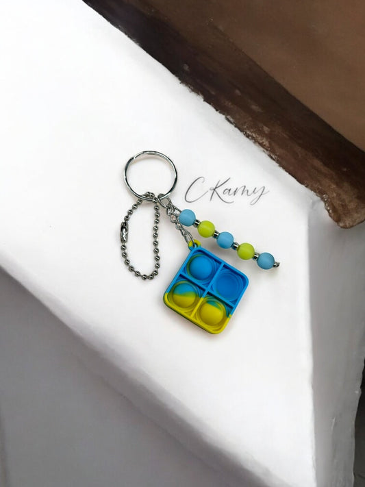 Porte clé personnalisé pop it carré jaune bleu