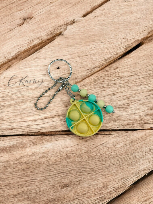 Porte clé personnalisé pop it rond jaune vert