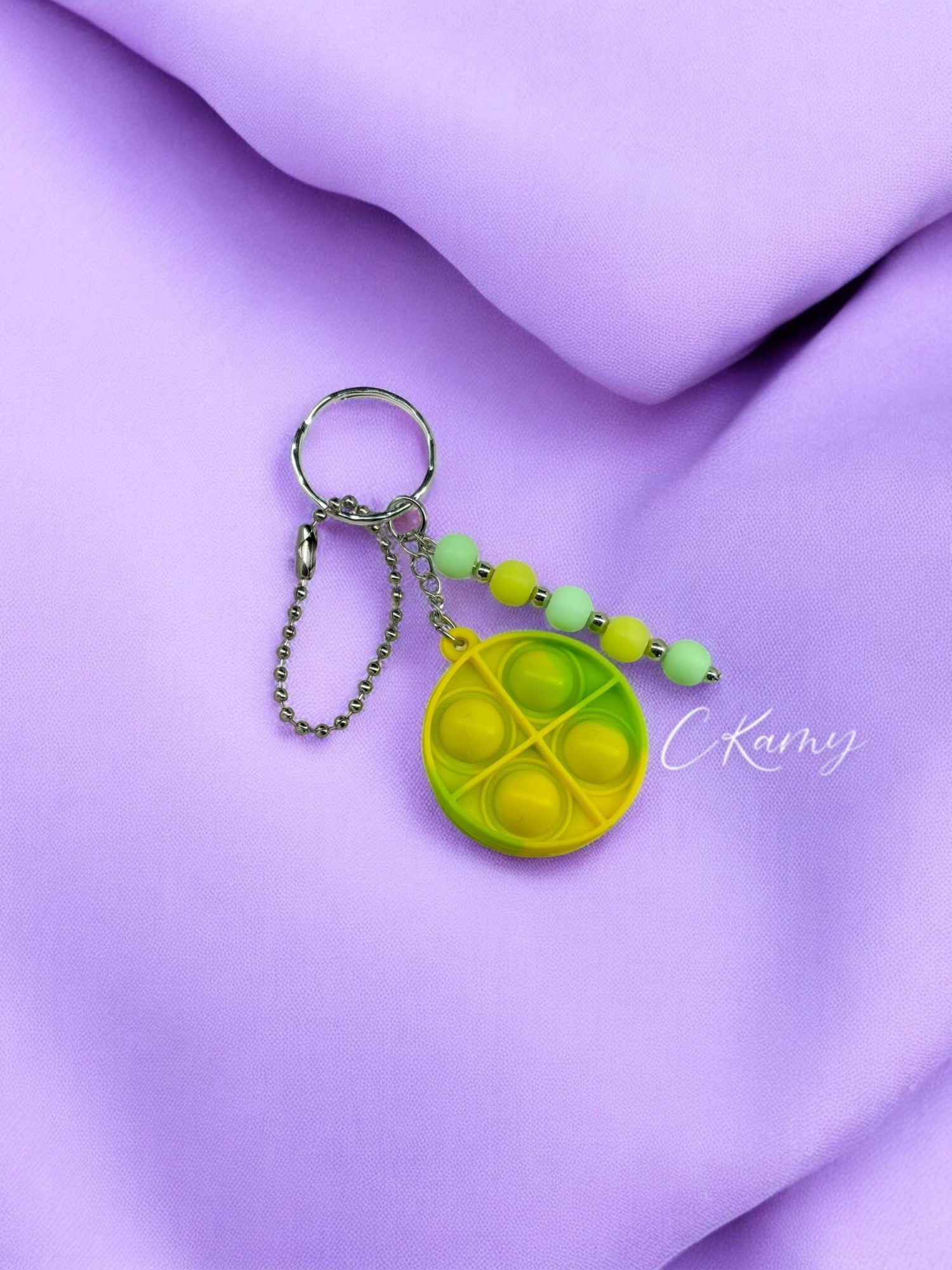 Porte clé personnalisé pop it rond jaune vert clair