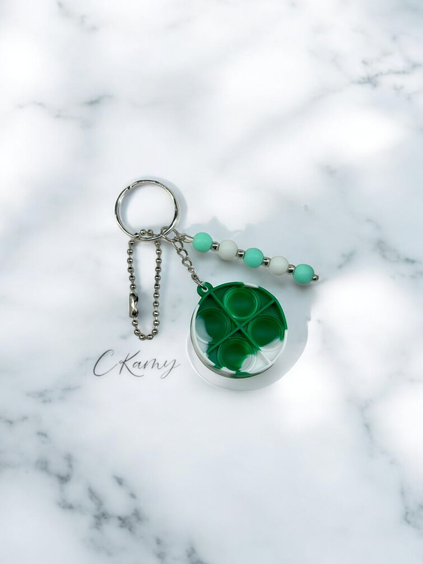Porte clé personnalisé pop it rond vert blanc