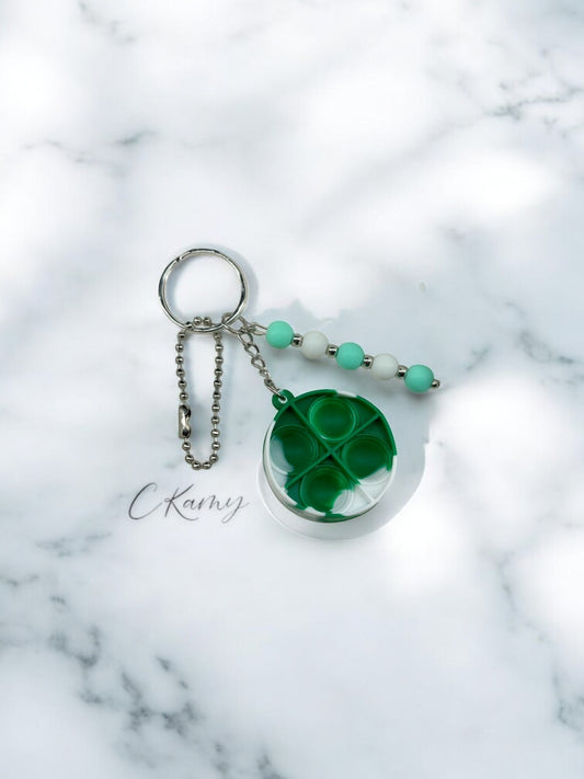 Porte clé personnalisé pop it rond vert blanc