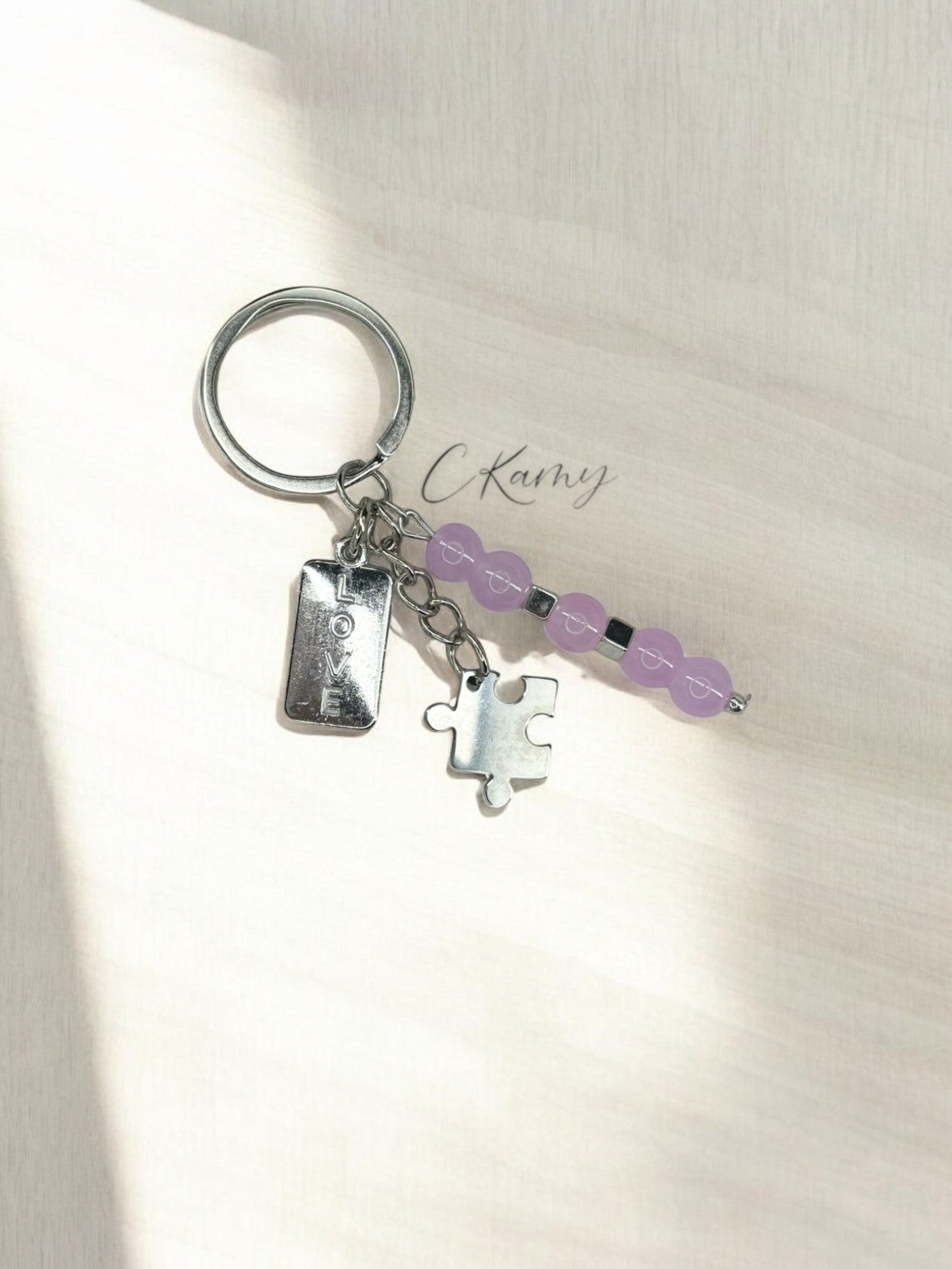 Porte clé personnalisé puzzle plaque violet
