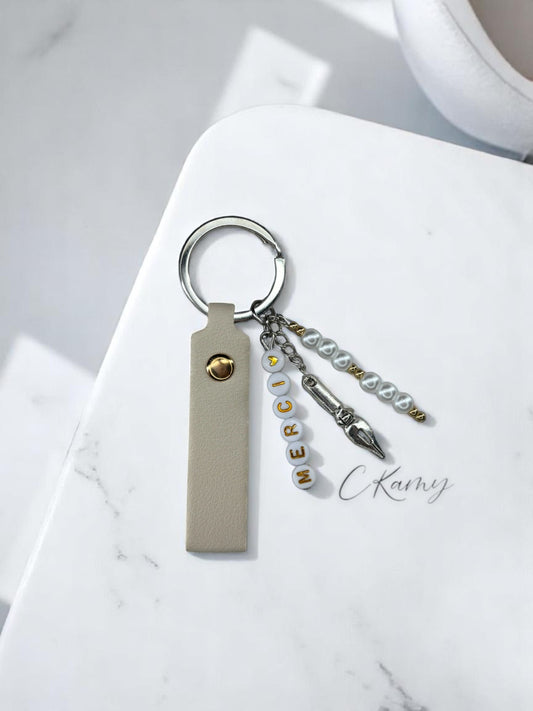 Porte clé personnalisé stylo plume