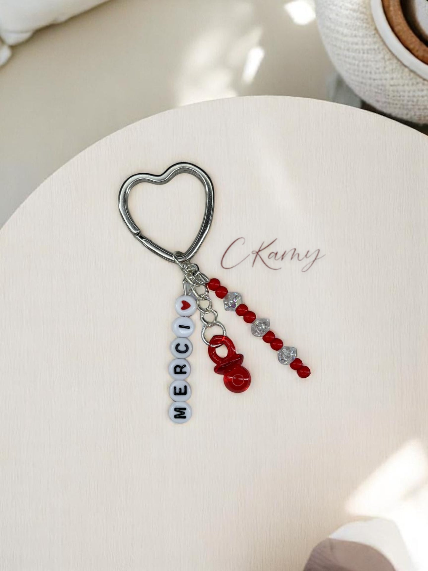 Porte clé personnalisé tétine rouge