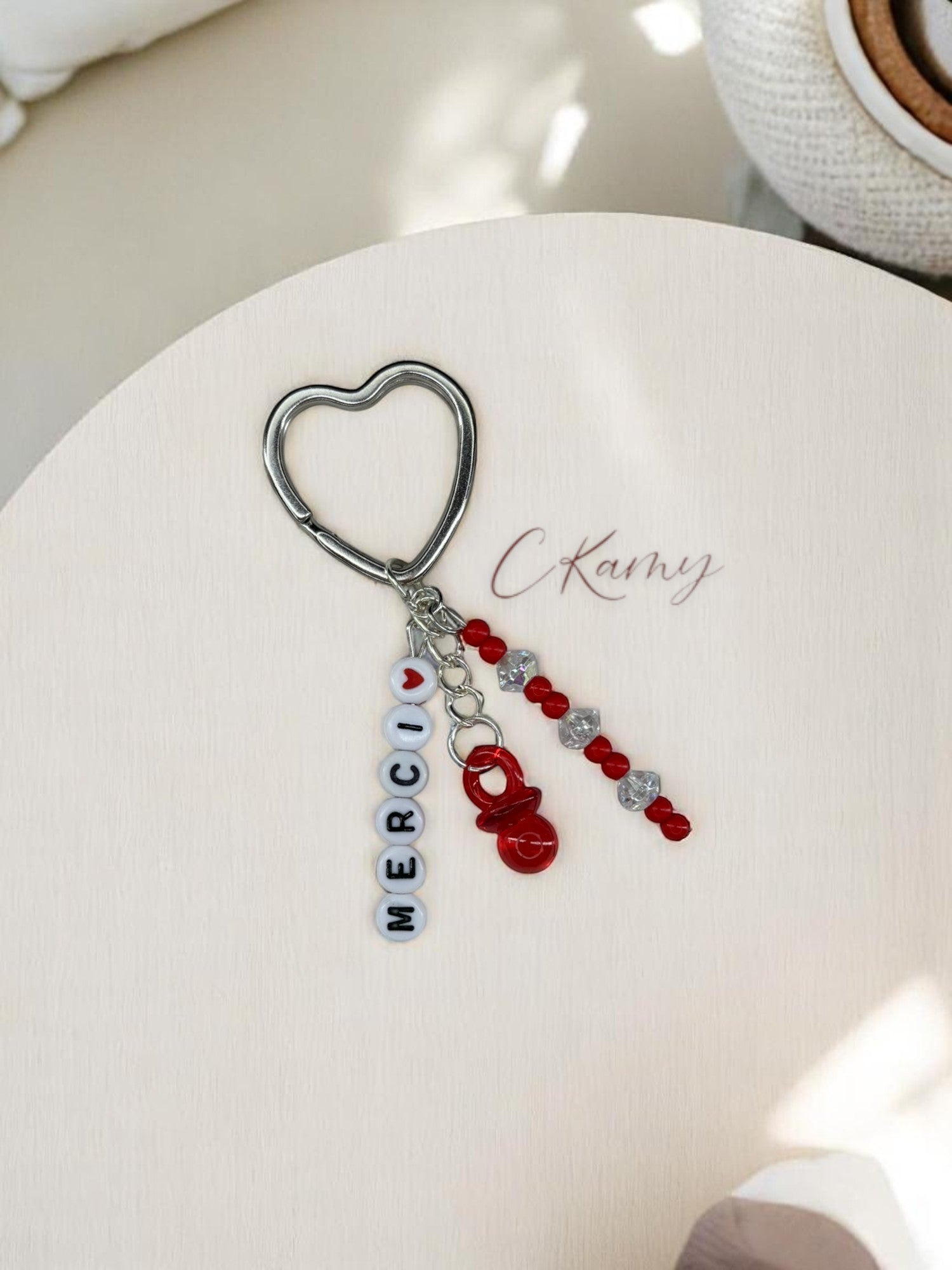 Porte clé personnalisé tétine rouge