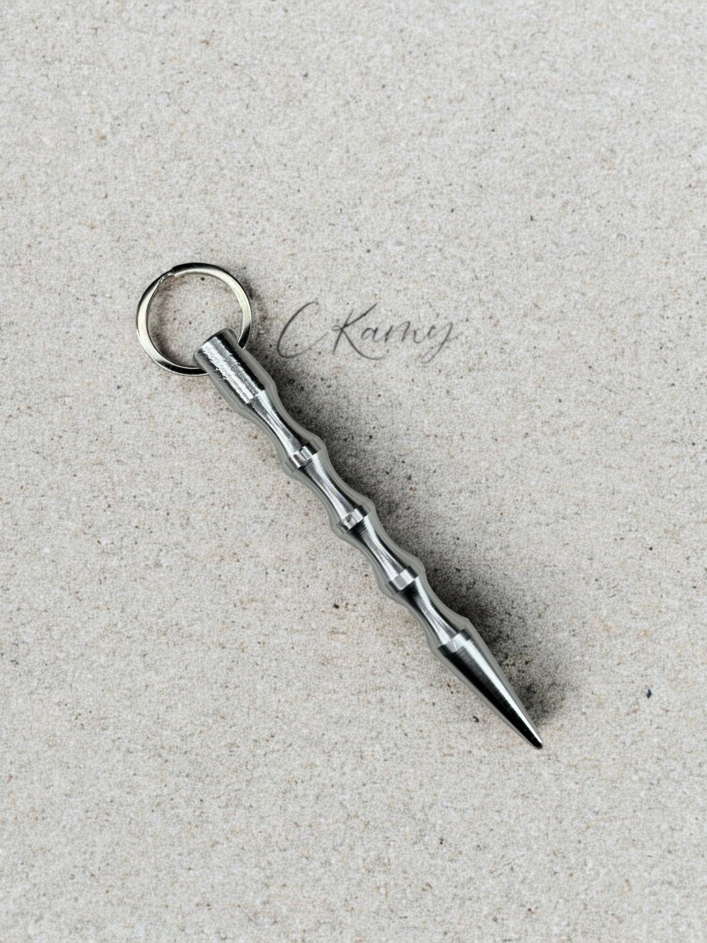 Porte clé pic de défense argent