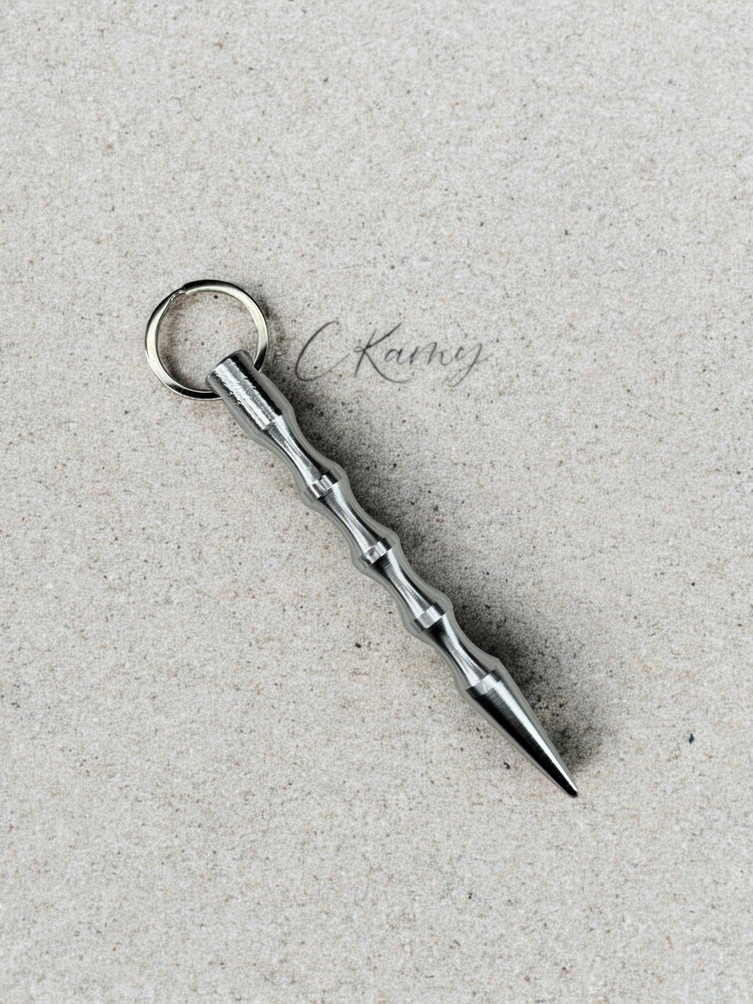 Porte clé pic de défense argent