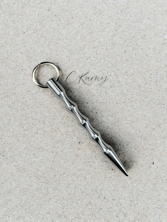 Porte clé pic de défense argent