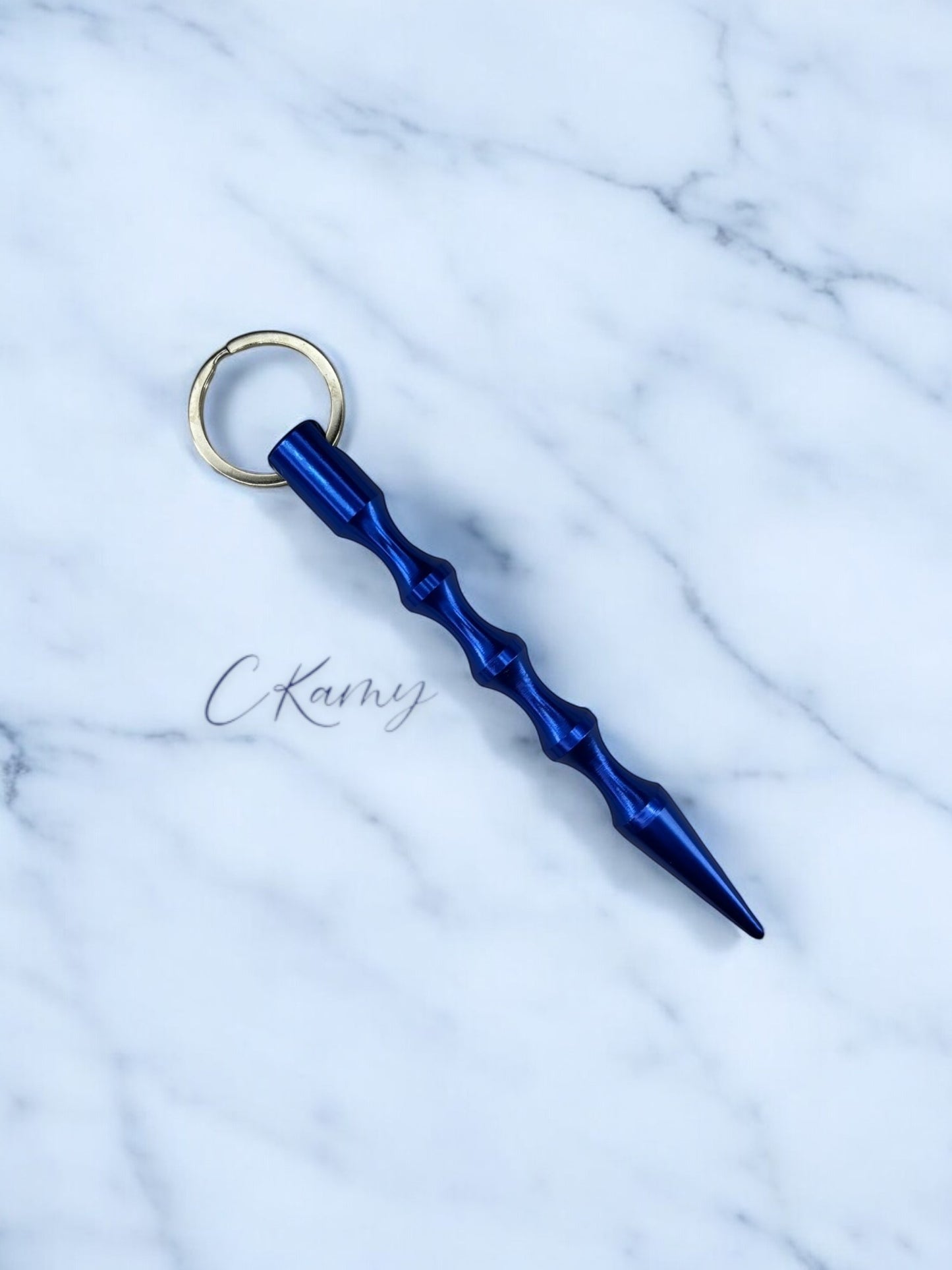 Porte clé pic de défense bleu