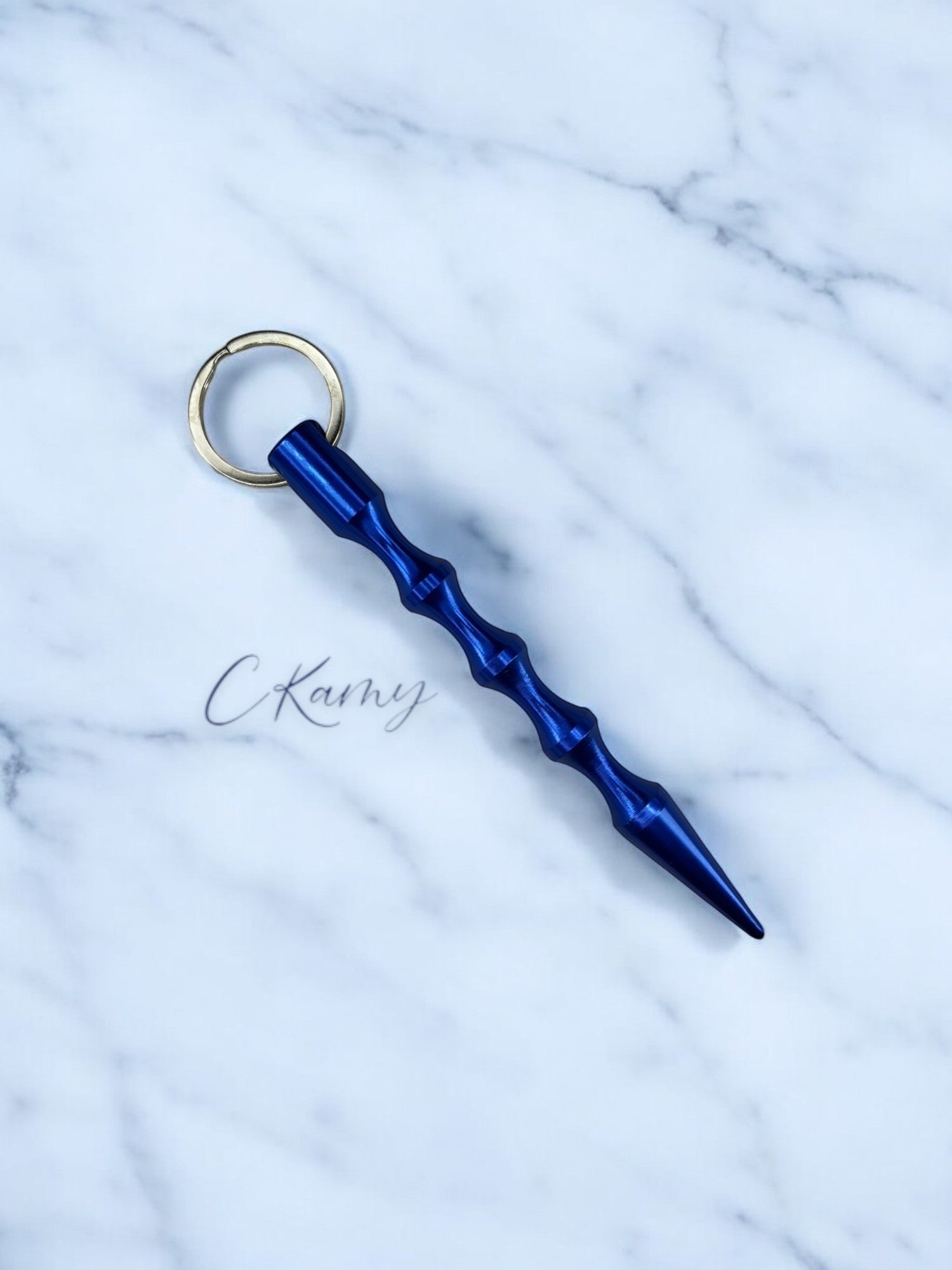 Porte clé pic de défense bleu