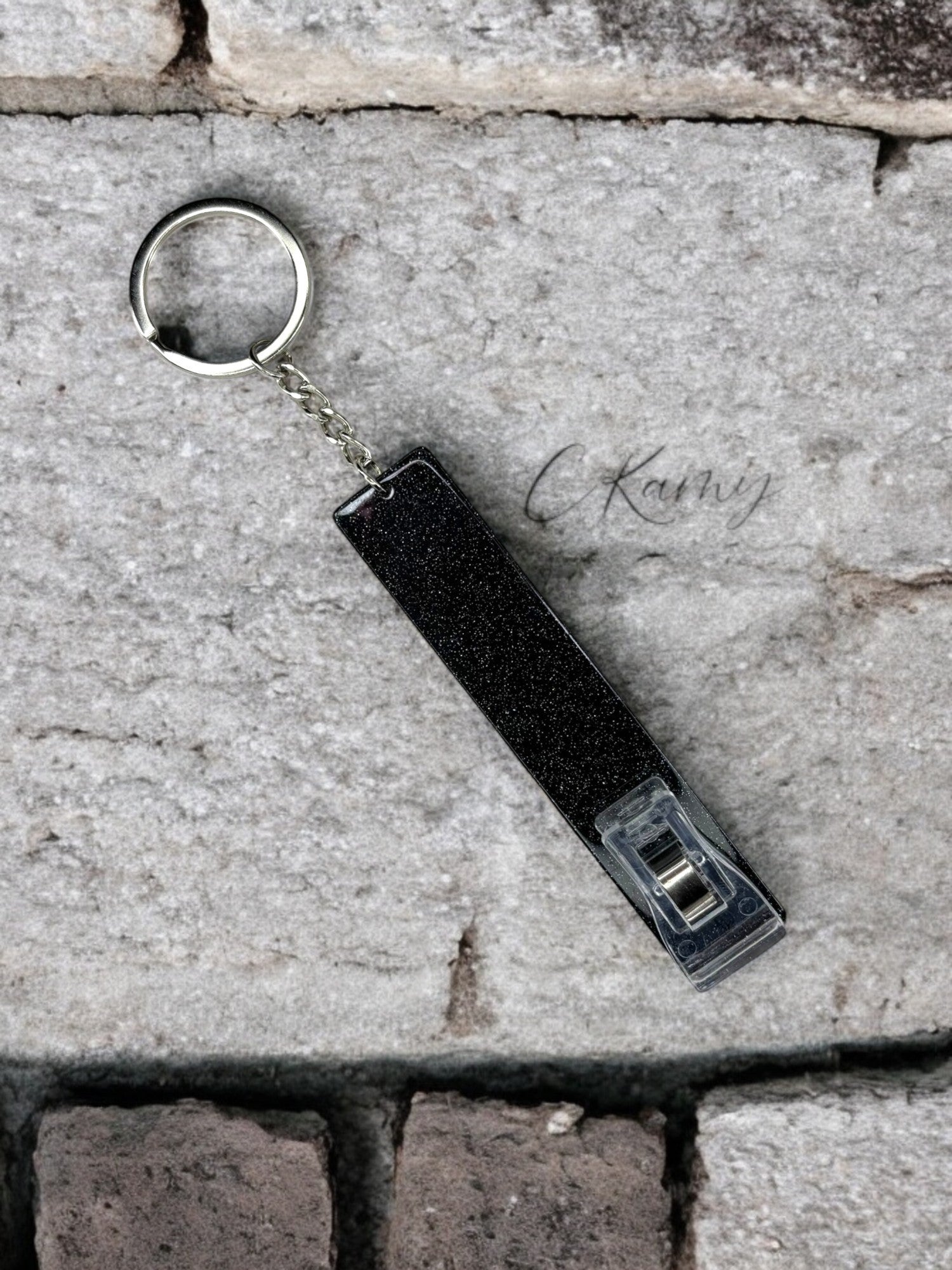Porte clé pince carte noir à paillettes