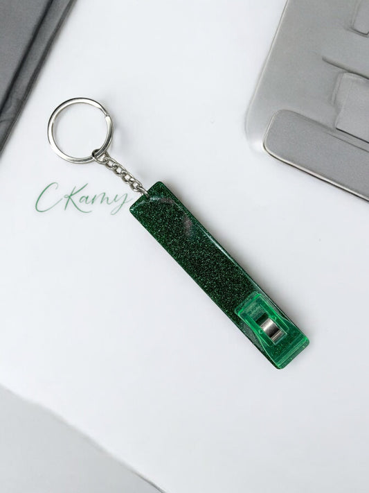 Porte clé pince carte vert à paillettes